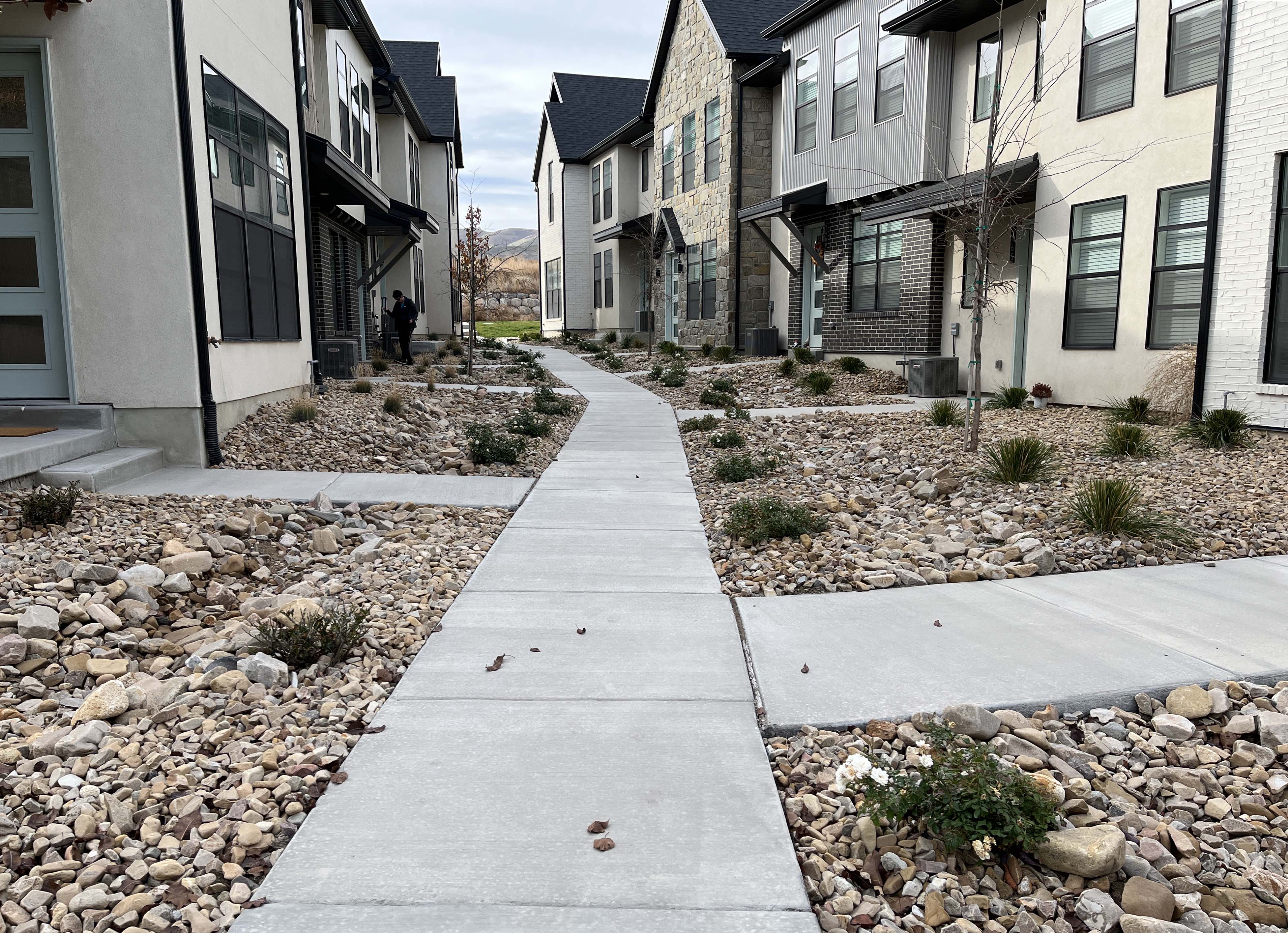 Picture of the courtyard of a townhome community with water-efficient landscaping
